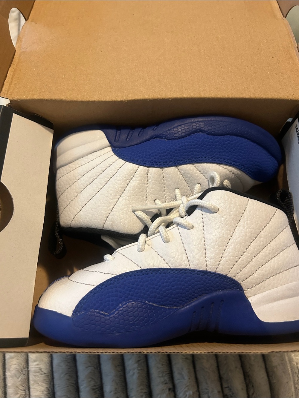 Jordan 12’s Retro toddler White and Royal Blue High-Top Sneakers